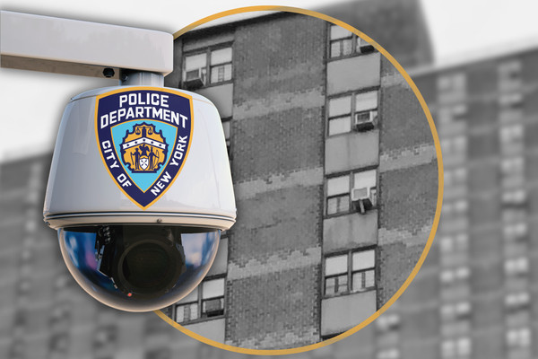 A NYPD camera set against a public housing building