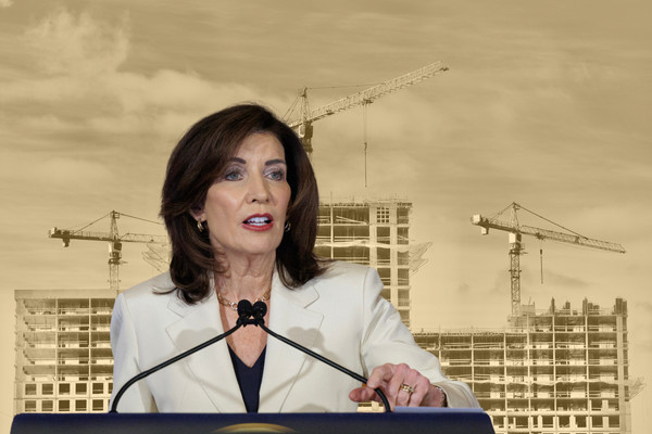 A photo collage of Governor Kathy Hochul in front of a yellow-tinted photo of three new apartment buildings under construction.