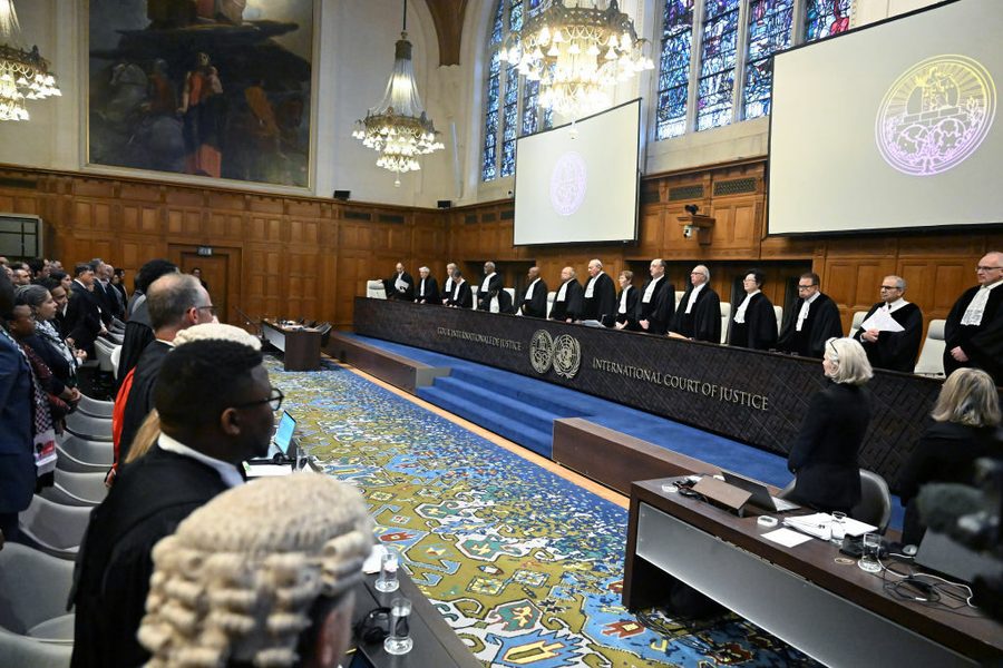Judges stand at the International Court of Justice, preparing to take their seats ahead of Israel's defense against South African's genocide accusations in the Hague, Netherlands.