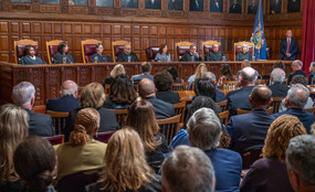 A group of people before the judges of the Court of Appeals