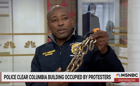 DCPI chief Tarik Sheppard displays a bike lock retrieved from Columbia University on MSNBC's Morning Joe on May 1, 2024.