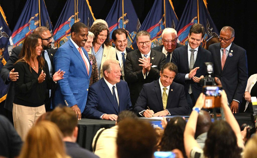 Governor Cuomo signing the CLCPA