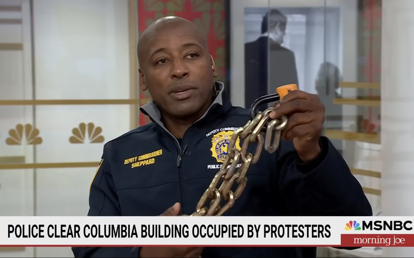 DCPI chief Tarik Sheppard displays a bike lock retrieved from Columbia University on MSNBC's Morning Joe on May 1, 2024.