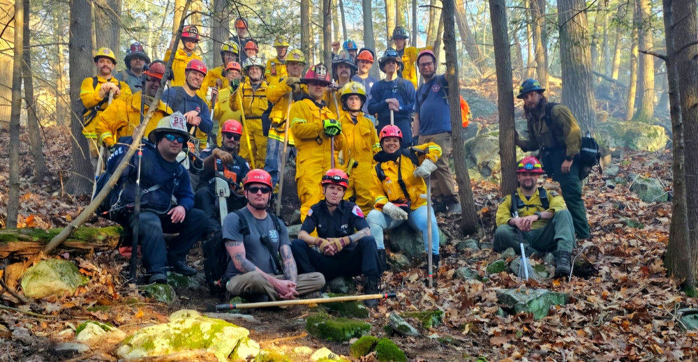 27 members of the Patterson Volunteer Fire Department in the forest.