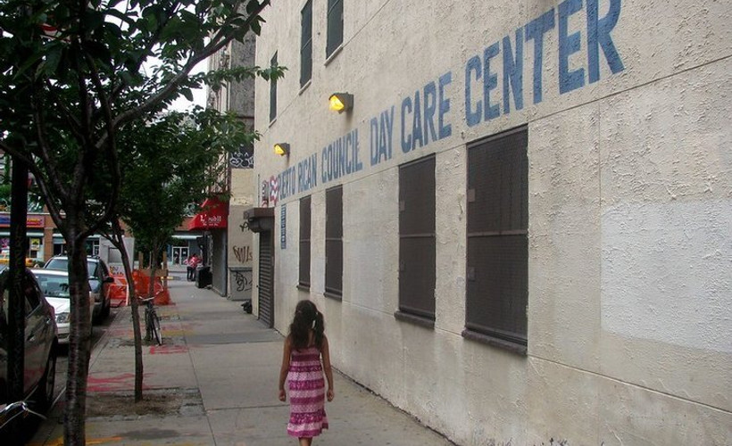 A child outside a day center