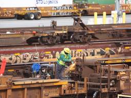 A worker at a Union Pacific Intermodal Terminal rail yard.