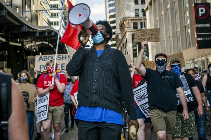Protesters march through downtown Minneapolis on June 11, 2020, with demands to defund or abolish the police.