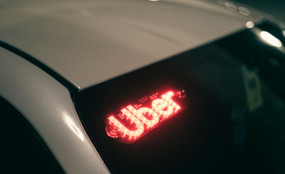 Photo of uber lit up in windshield