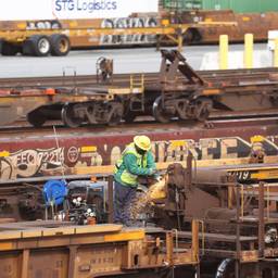 A worker at a Union Pacific Intermodal Terminal rail yard.
