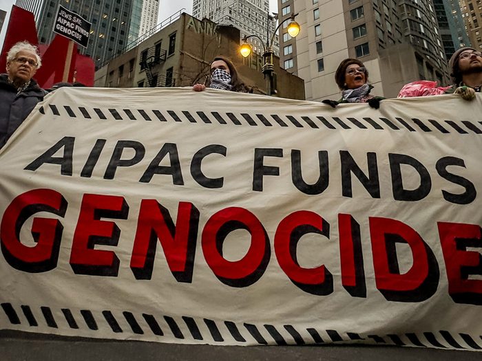 Peace activists rally outside the New York offices of the American Israel Public Affairs Committee on February 22 to decry the lobby’s influence on U.S. politics.
