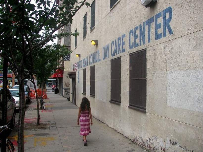 A child outside a day center