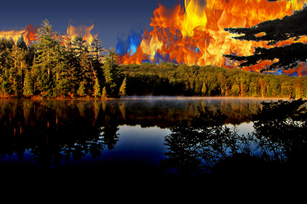 A forest overlooking Long Pond in the St Regis Canoe Area of Adirondack Park with artificial flames superimposed in the sky.