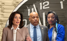 Photo collage of Governor Kathy Hochul, Assembly Speaker Carl Heastie, and Senate Majority Leader Andrea Stewart-Cousins. Behind them, a huge clock nears midnight, and stacks of papers loom.