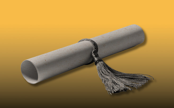 A high-contrast photo of a rolled up graduation diploma closed with a tassel against an orange and black background.