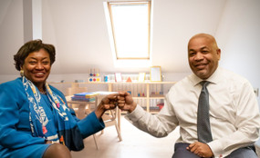 Heastie and ASC in front of a child care classroom