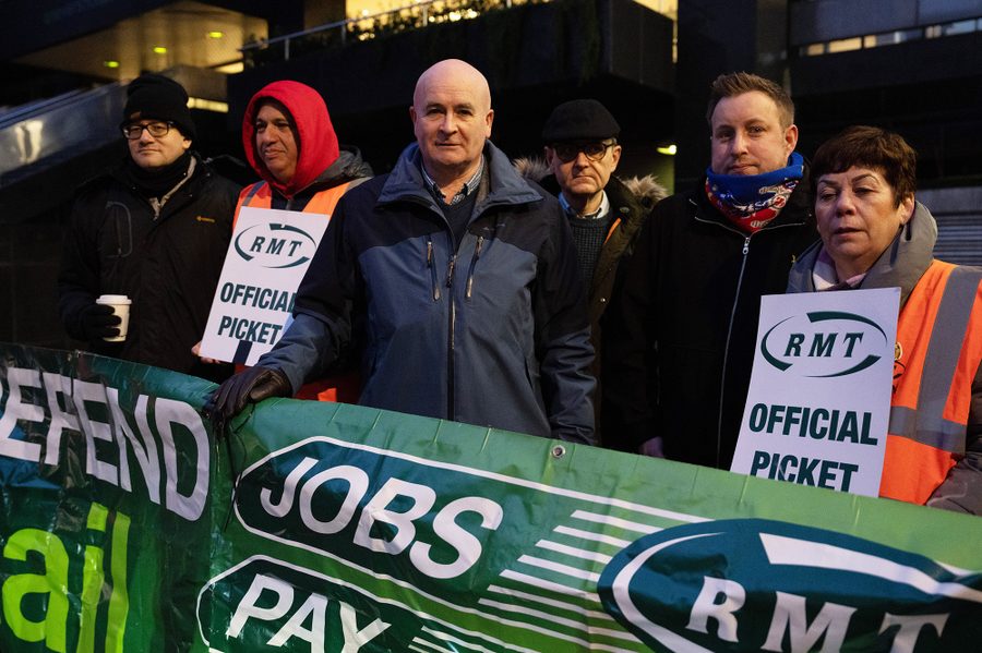 Mick Lynch, general secretary of the Rail, Maritime, and Transport Workers union, stands on a picket line in London, England.