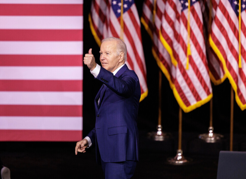 A picture of President Joe Biden with a thumbs up.