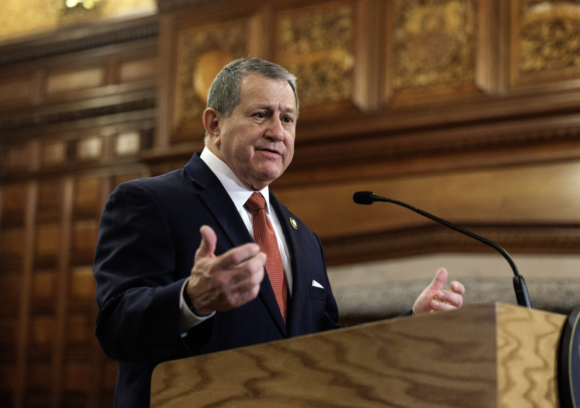 Congressman Joe Morelle stands and speaks at a podium.