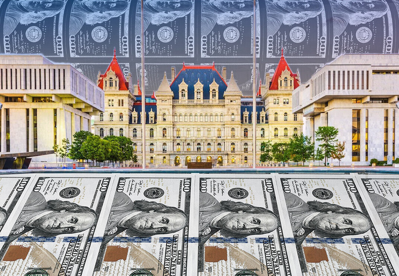 Albany Capitol superimposed over 100 dollar bill money printer