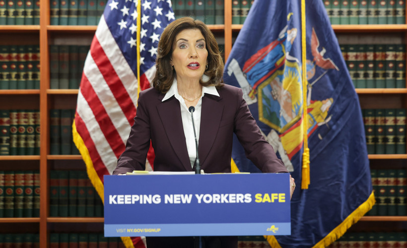 Gove Kathy Hochul at a podium