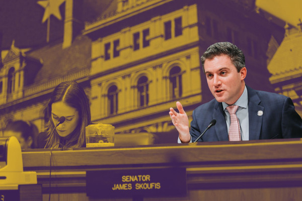 New York Senator James Skoufis is shown sitting down and speaking into a microphone during a legislative hearing.