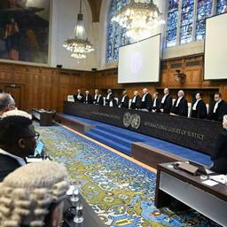 Judges stand at the International Court of Justice, preparing to take their seats ahead of Israel's defense against South African's genocide accusations in the Hague, Netherlands.