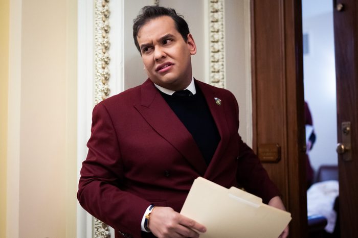Former Rep. George Santos, looking like a cranky teenager in the U.S. Capitol on November 28, 2023.
